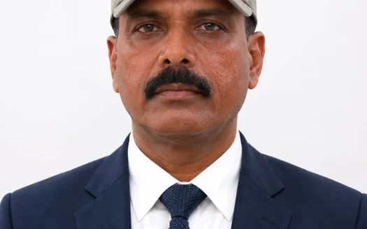 Gopal Singh 2 Gopal Singh, experienced real estate agent at BigLandProperty.com, wearing a navy blue suit, professional portrait photo